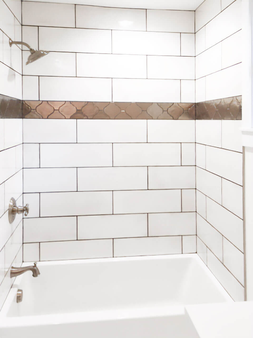 white brick tile shower